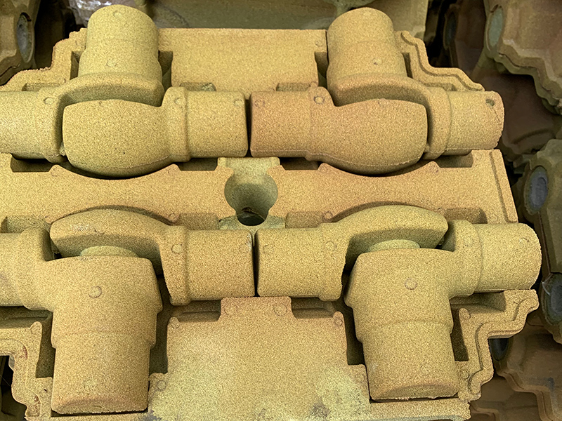 Cum se rezolvă defectul de lipire a nisipului în producerea pieselor gri din fontă folosind tehnologie de nisip acoperită cu film?